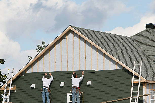 Professional Siding Contractor technician working in Hebron, IN